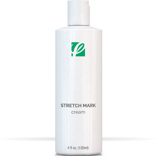 bottle of private labeled Stretch Mark Cream sitting on table