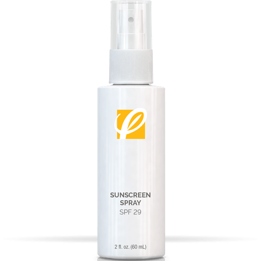 bottle of private labeled Sunscreen Spray SPF 29 sitting on table