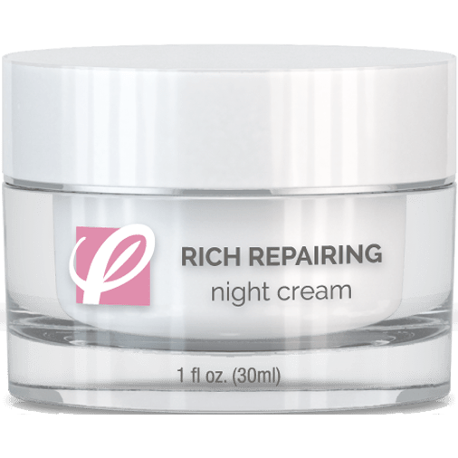 bottle of private labeled Rich Repairing Night Cream sitting on table